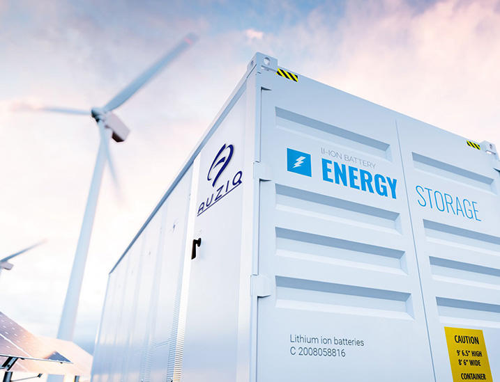 An AUZIQ energy Li-ion battery energy storage container sits below a wind turbine.